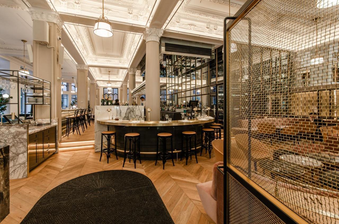 Hotel Birks Montreal Bagian luar foto The interior of the restaurant
