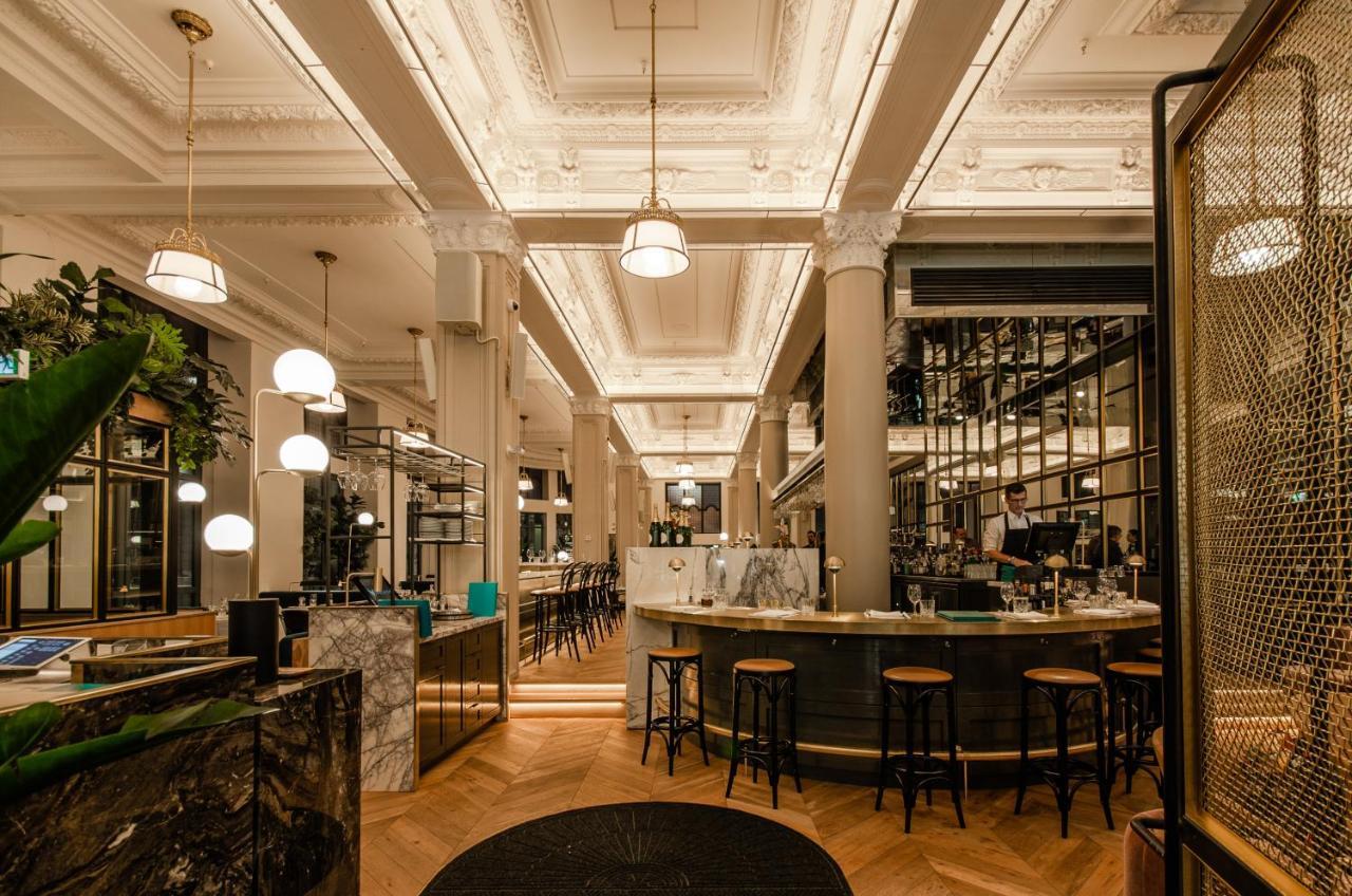 Hotel Birks Montreal Bagian luar foto The interior of the restaurant