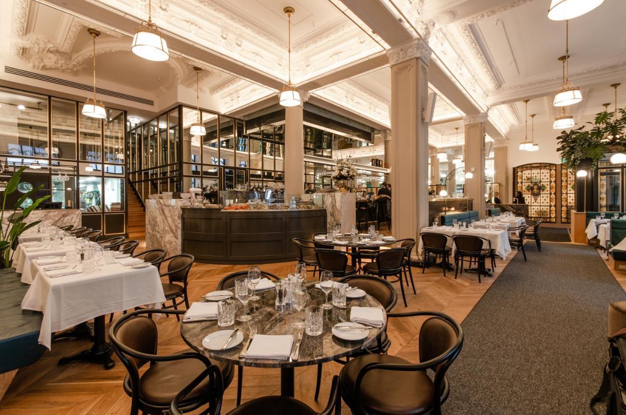 Hotel Birks Montreal Bagian luar foto The interior of the restaurant